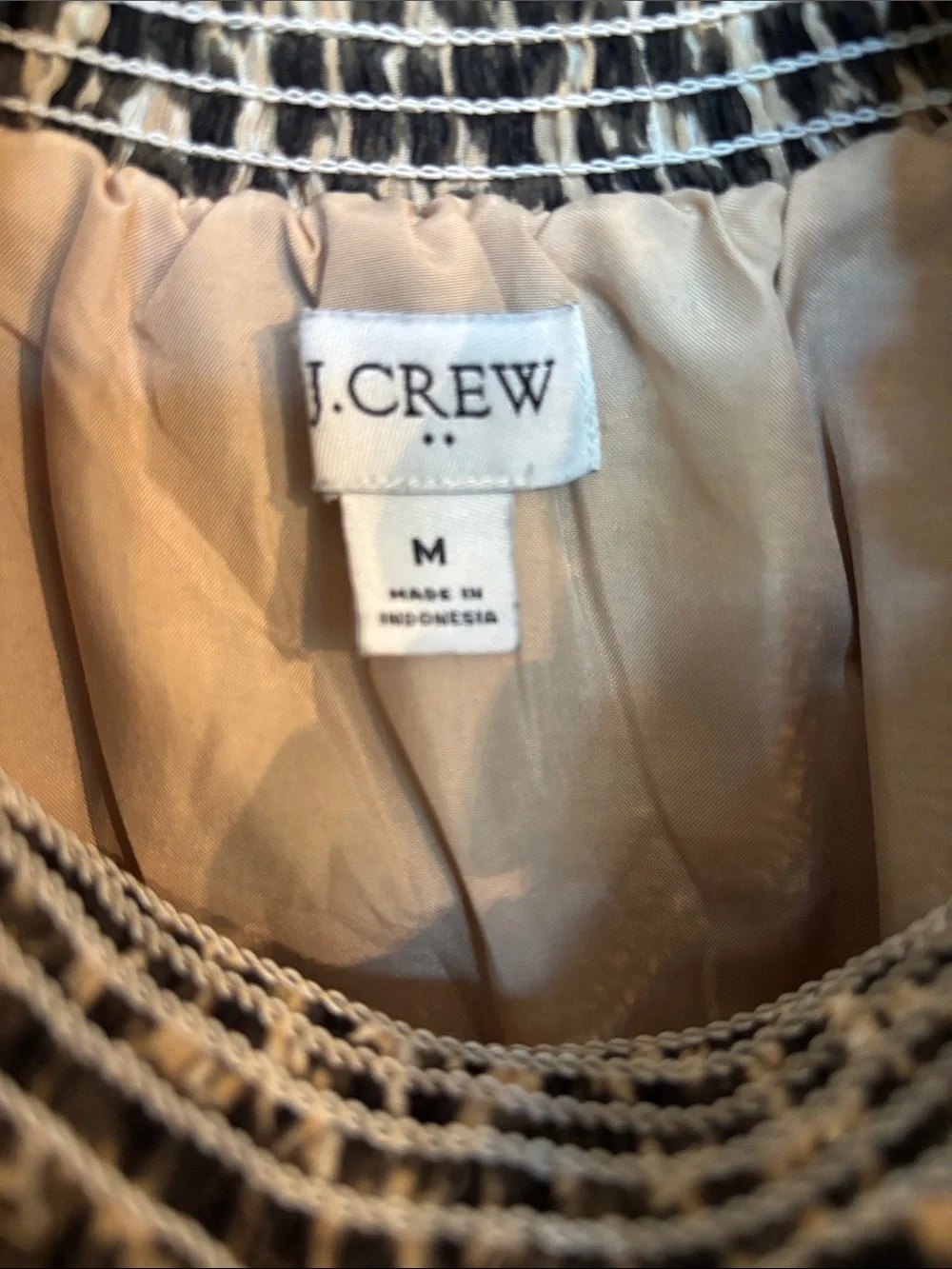 J Crew trendy animal print blouse with sheer sleeves and smocking at neckline